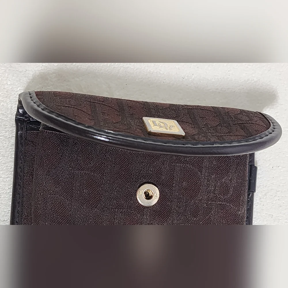 Christian Dior Trotter coin pouch.